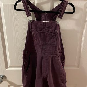 Purple overalls